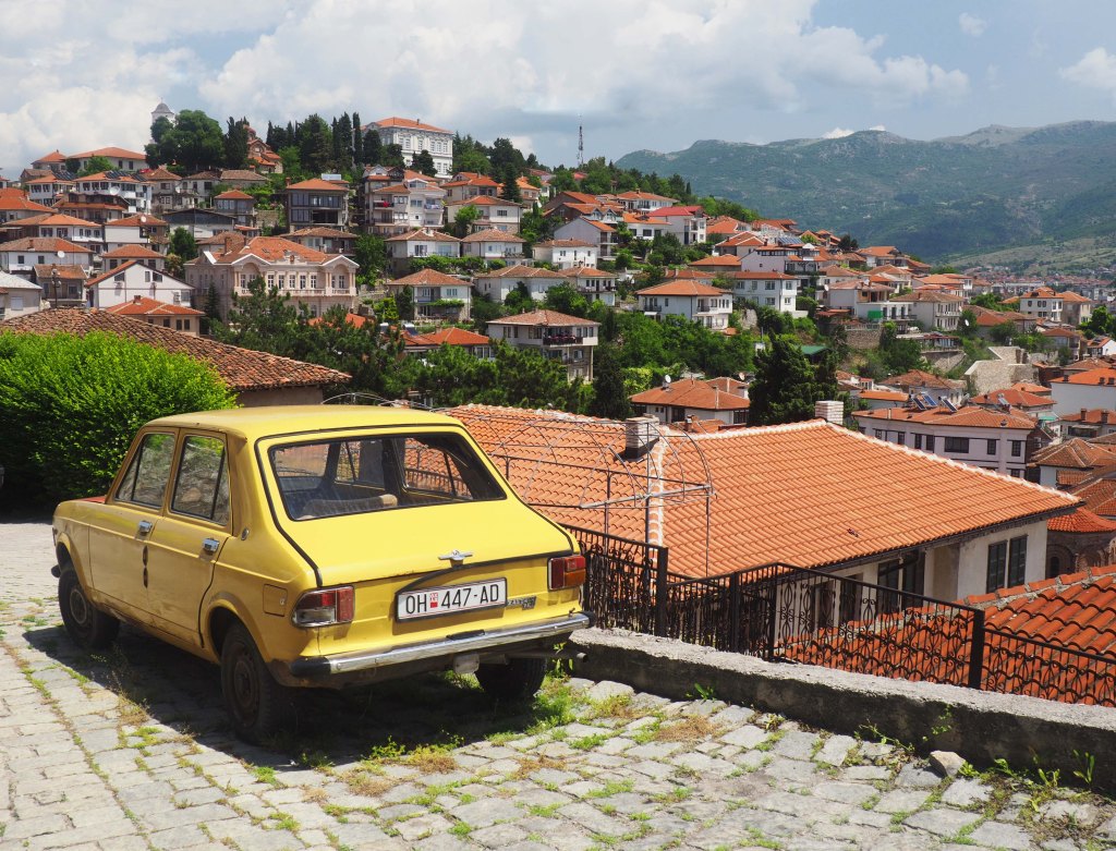 Yellow Zastava and view of Ohrid houses and lake